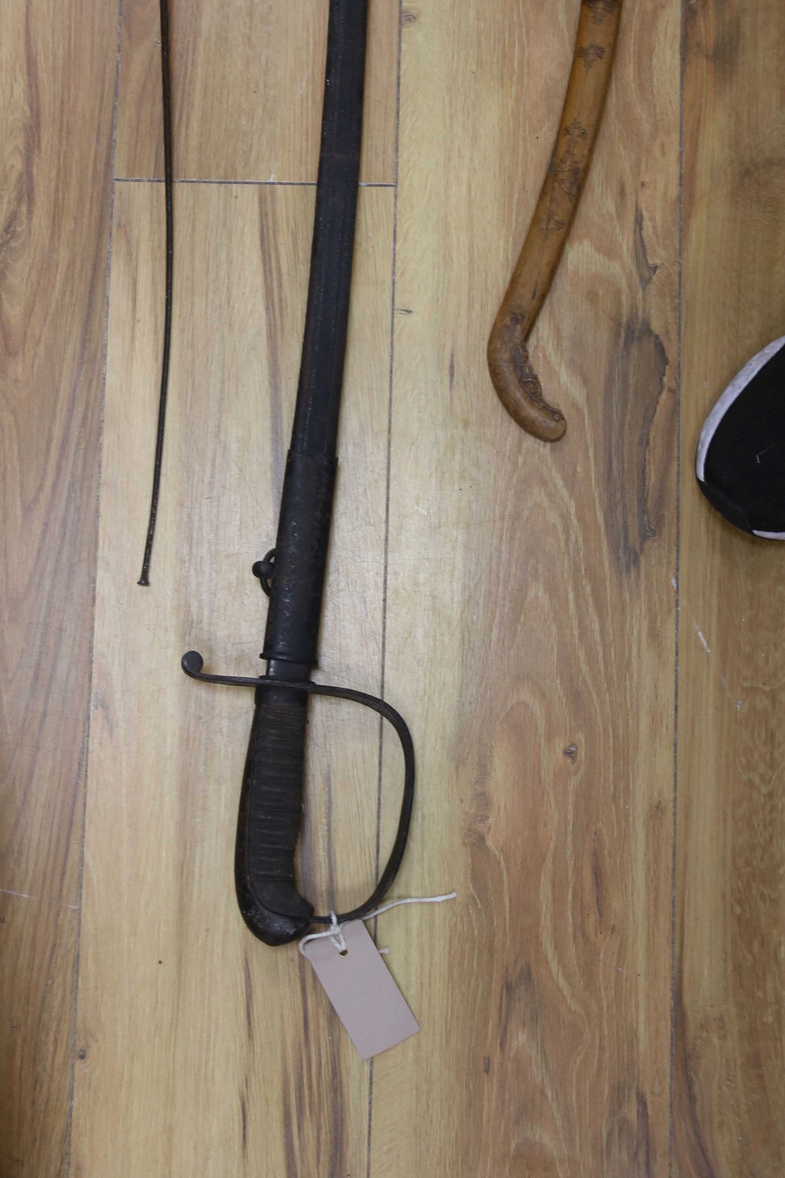 A Dutch East Indies short sword / kris having horn handle and gold inlay, another similar, a late 19th century sword and scabbard, an epee and another sword (5)
